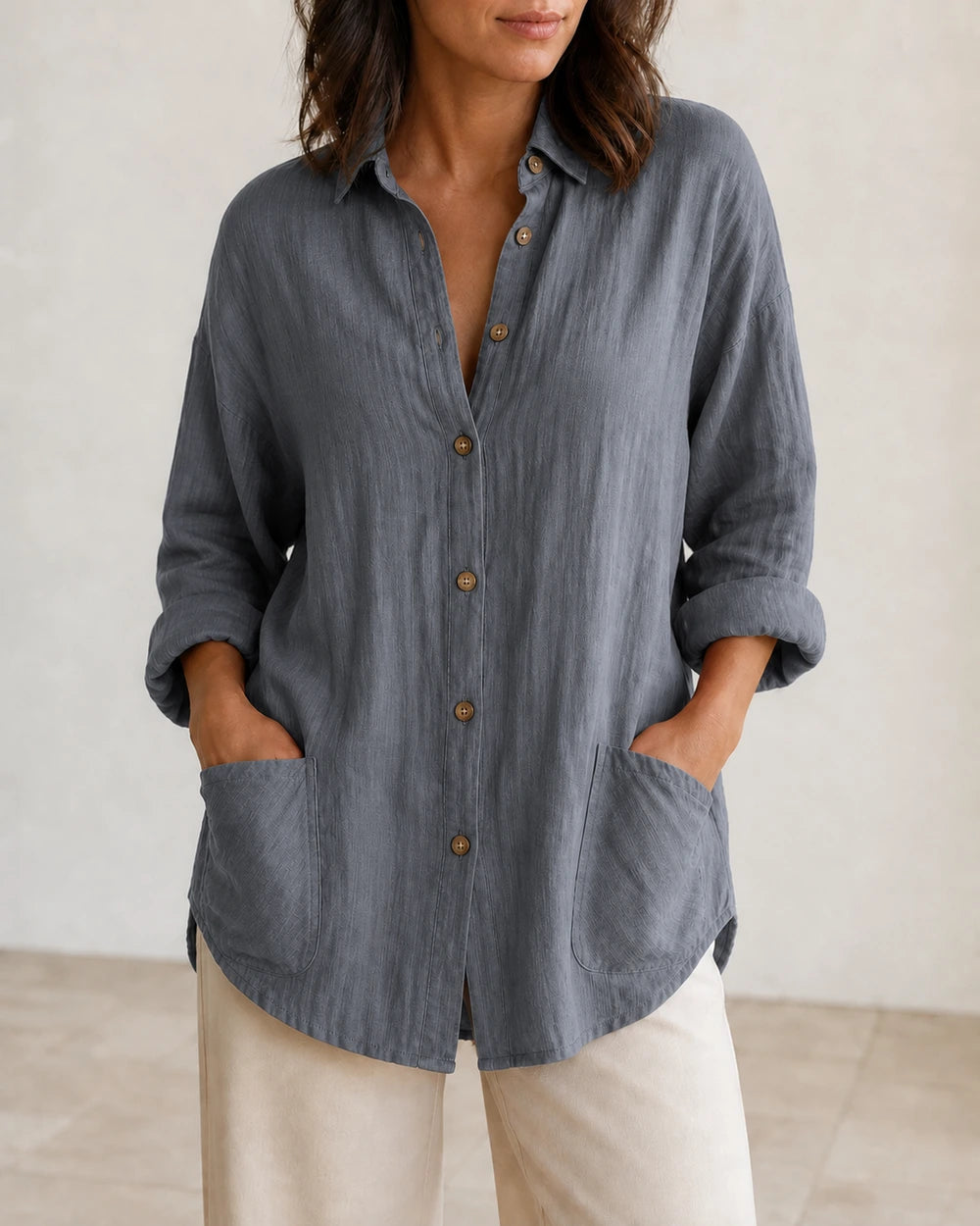 Women's grey relaxed longline shirt, front product view.