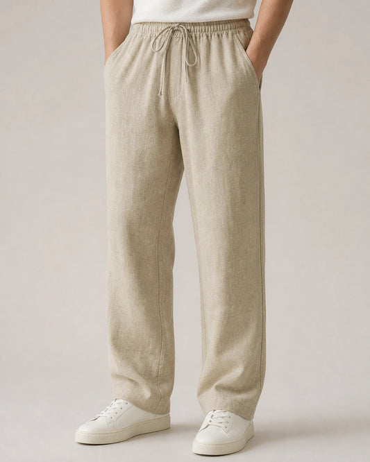 Men’s beige linen wide-leg pants with elastic drawstring waist, front three-quarter view.