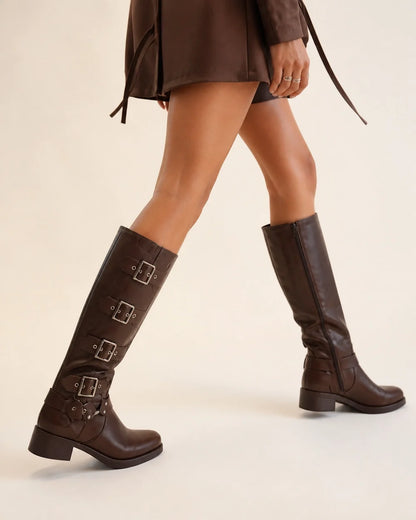 Brown knee-high multi-buckle biker boots walking view